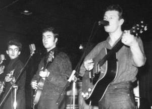 Tony Sheridan, right, with John Lennon, center, and George Harrison in Germany, about 1960.